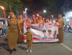 Dinas Dukcapil Wajo Turut Semarakkan Pawai Obor HUT RI Ke-80